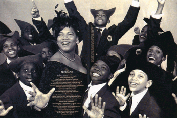 Queen Latifah with choirboys wearing Maria Del Greco hats